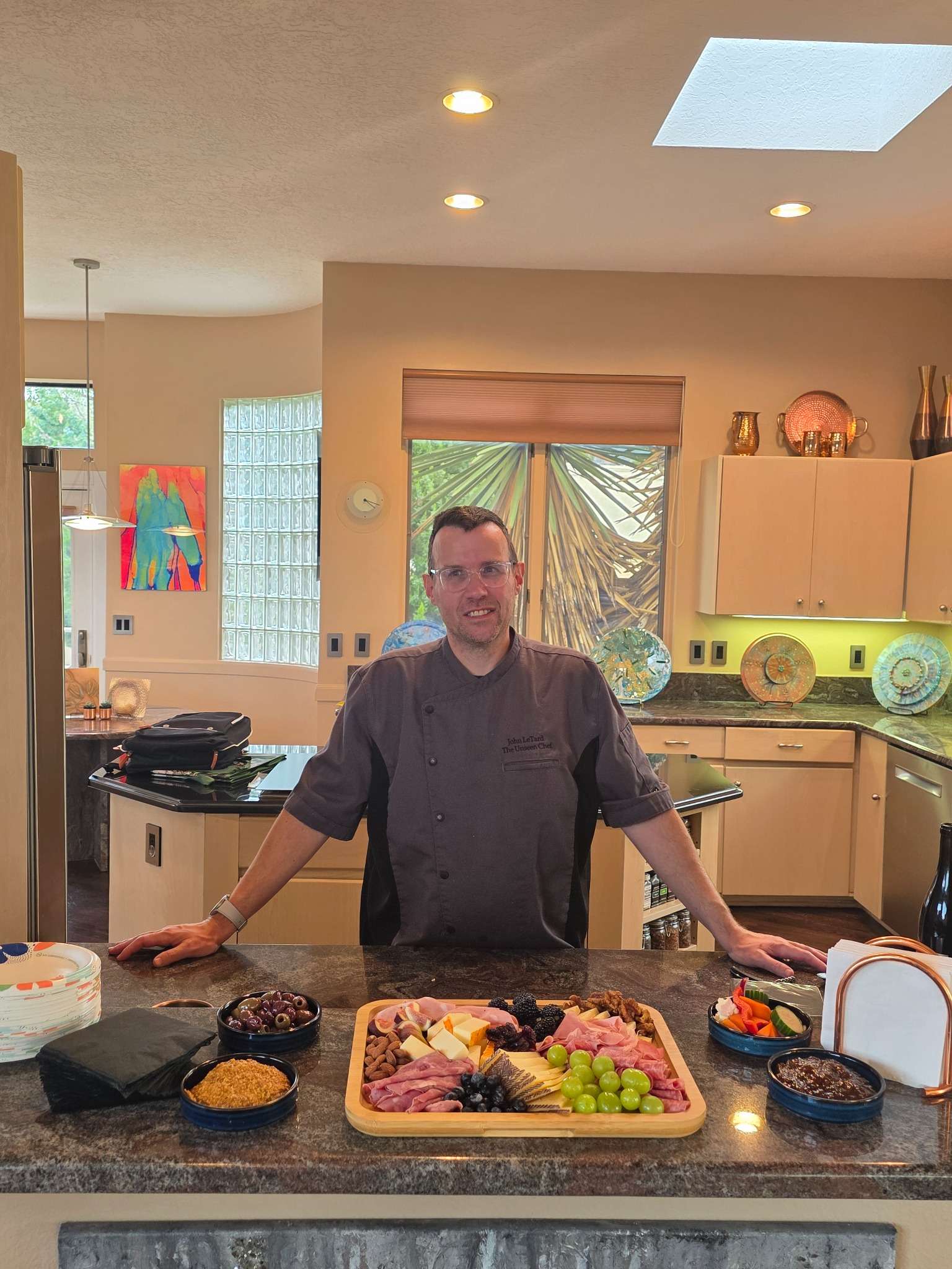 Chef John LeTard with a charcuterie reception spread